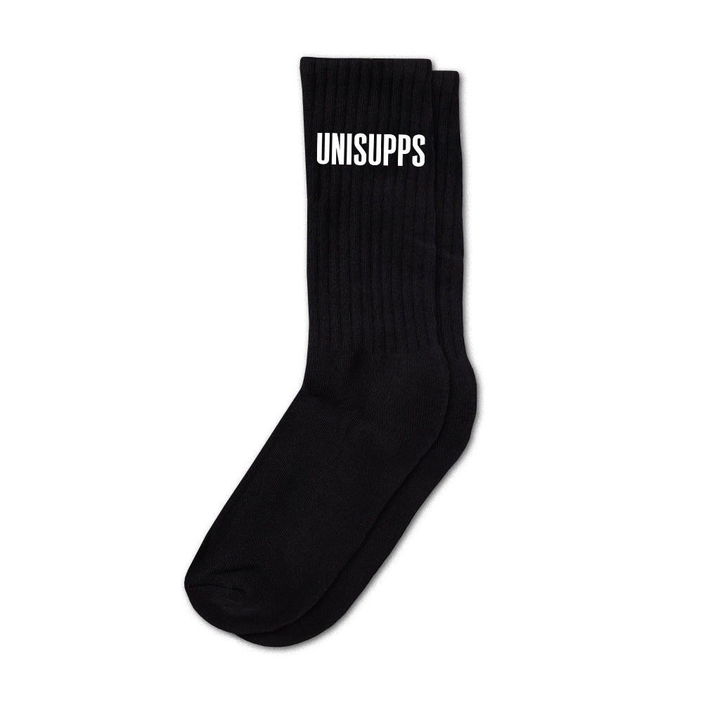 UNISUPPS High Quality Socks schwarze Sportsocken Nahaufnahme Polsterung Fersenbereich weisser Hintergrund